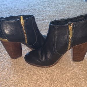 Coach black leather ankle bootie with zipper and heel